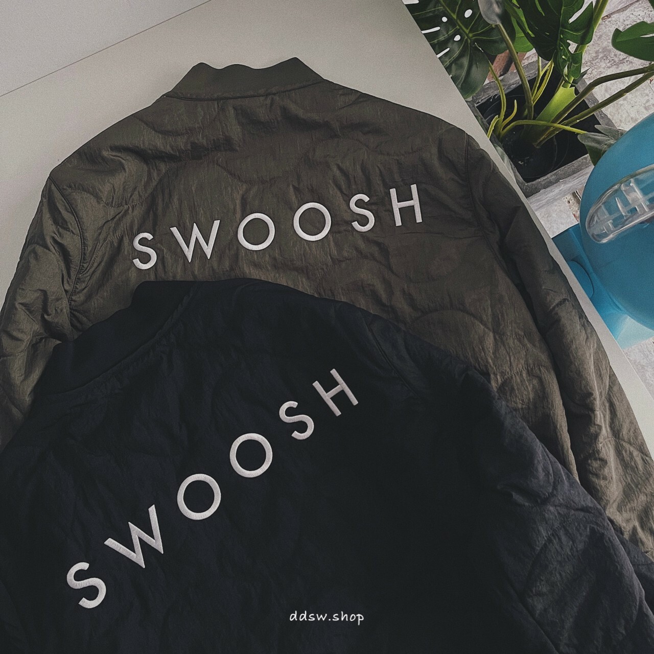 NIKE SWOOSH 葫蘆紋 衍縫外套 黑色 軍綠