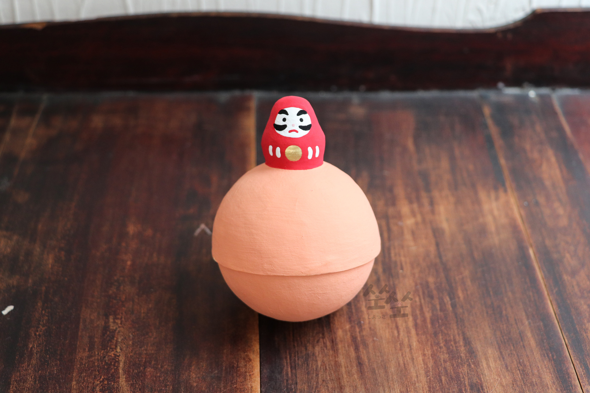 七轉八起 達摩和紙娃娃