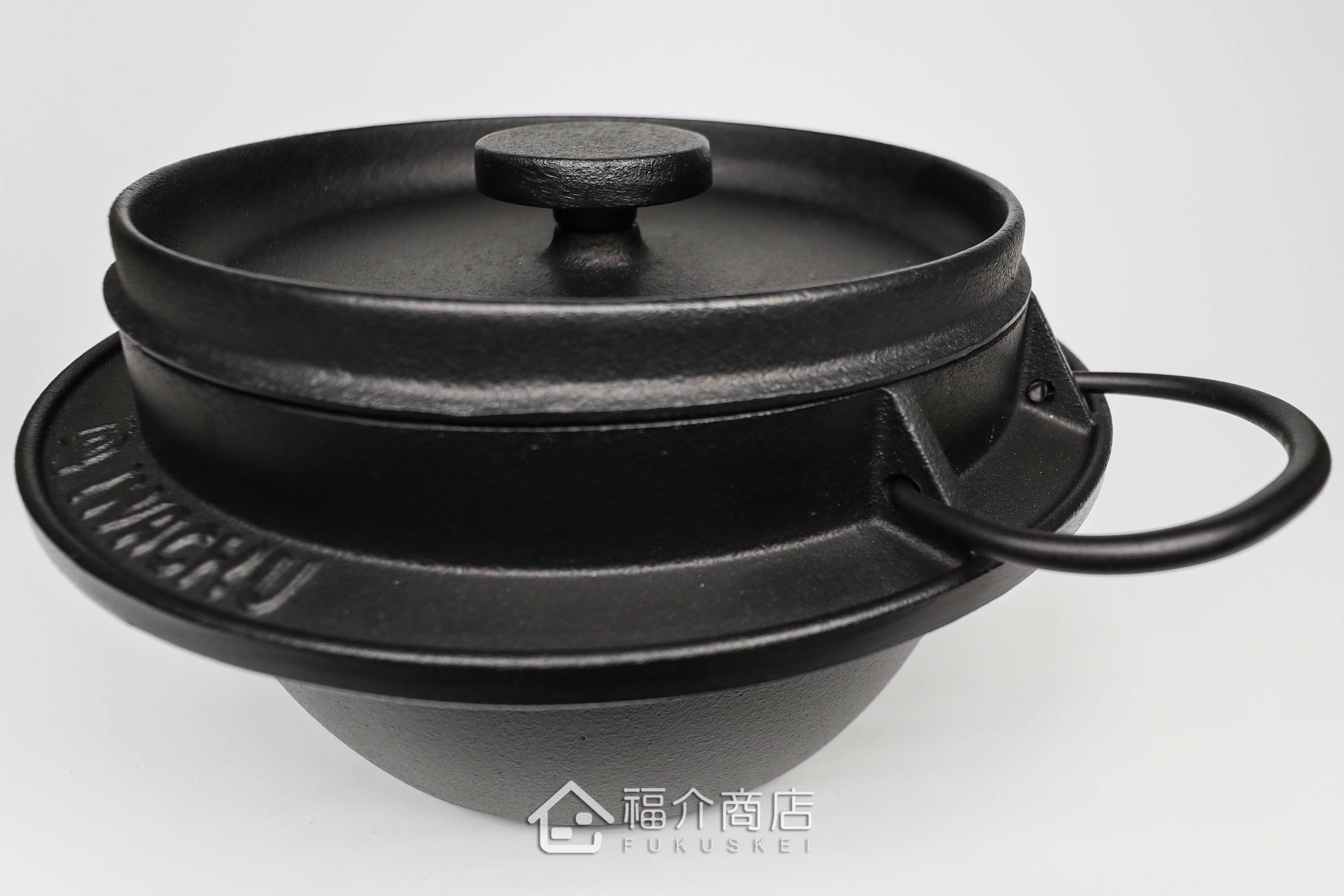 煮飯用的黑色鑄鐵鍋