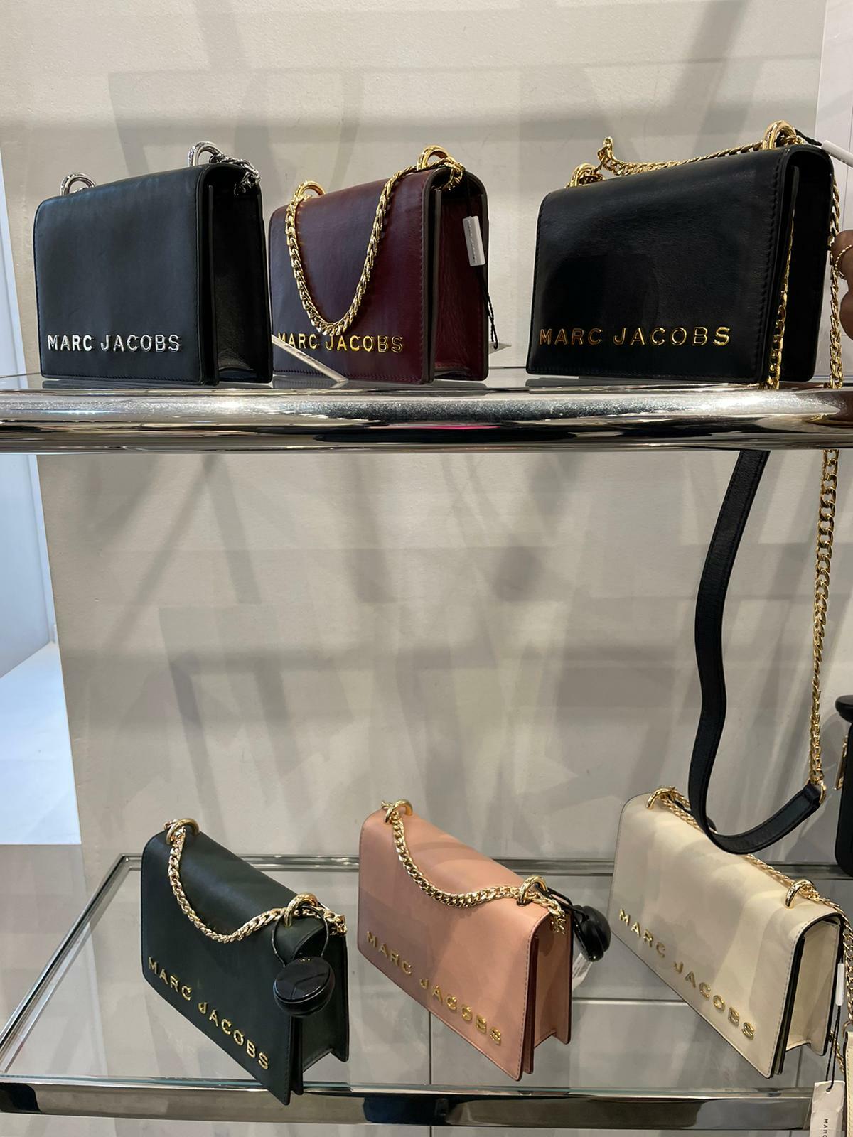 MARC JACOBS LEATHER CHAIN SLING BAG WITH WORDS LOGO