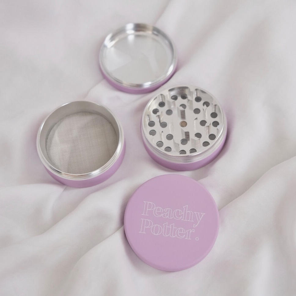 PURPLE HAZE HERB TOBACCO GRINDER BY PEACHY POTTER