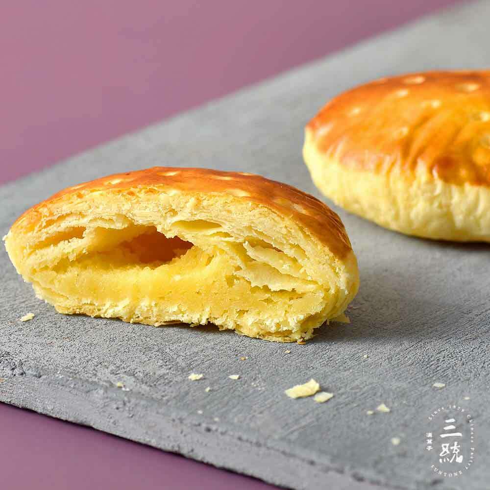 太陽餅保存期限 三統牛奶太陽餅剖面，餅皮酥鬆