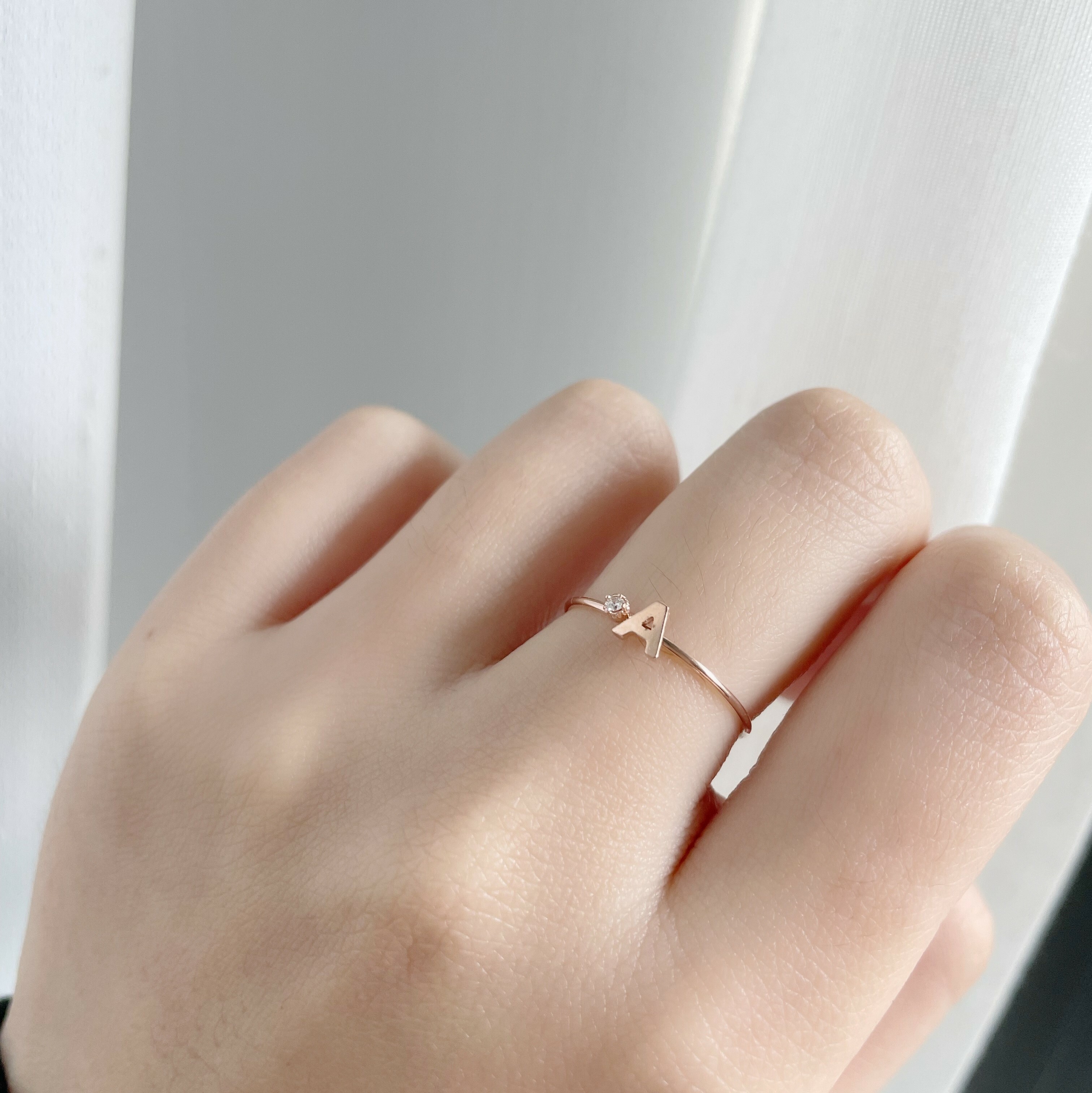 14K玫瑰金 1.5分白鑽字母戒指