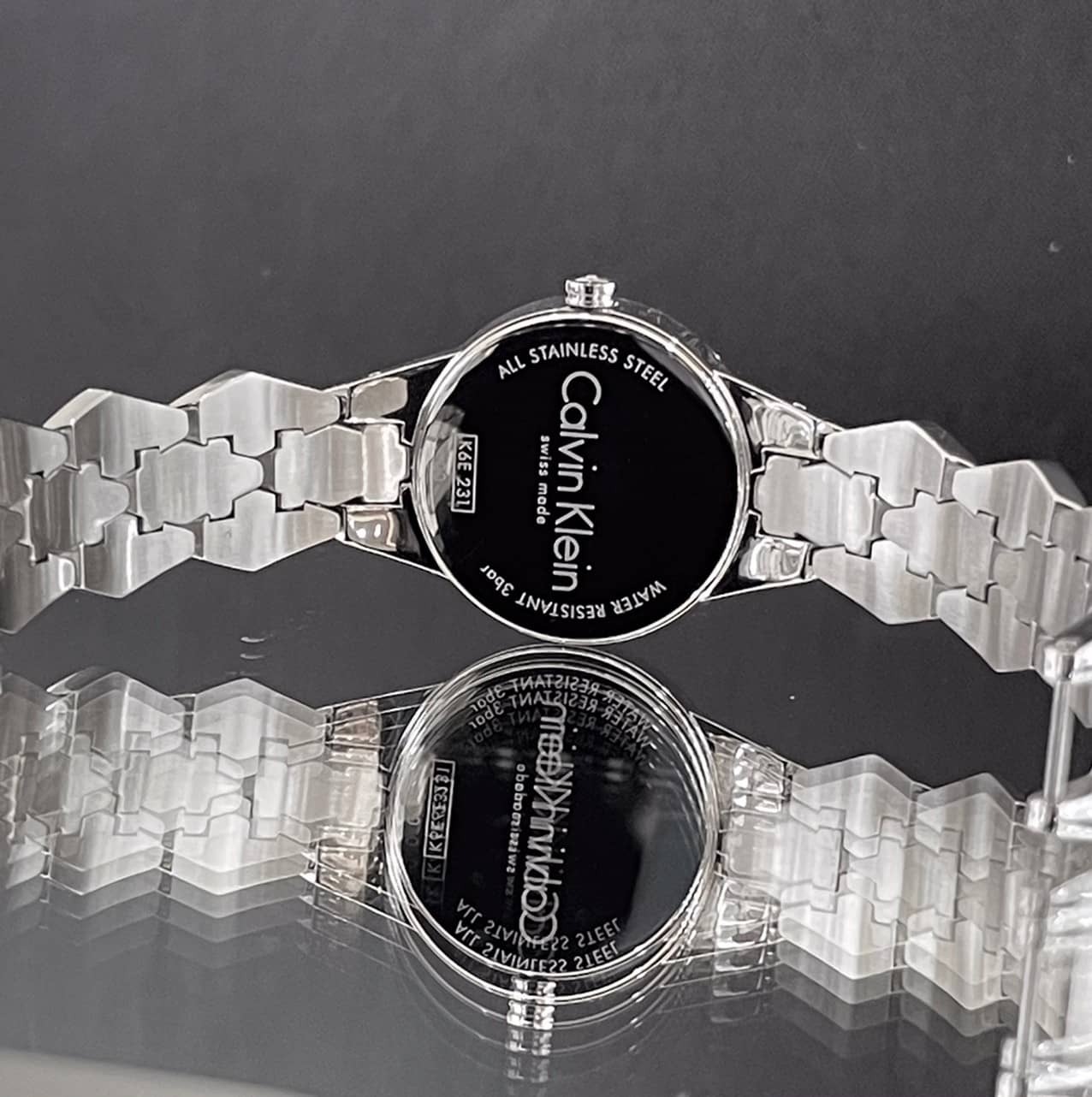 CALVIN KLEIN】SNAKE系列高雅銀黑色珠寶扣女錶K6E23141 28mm 現代鐘錶