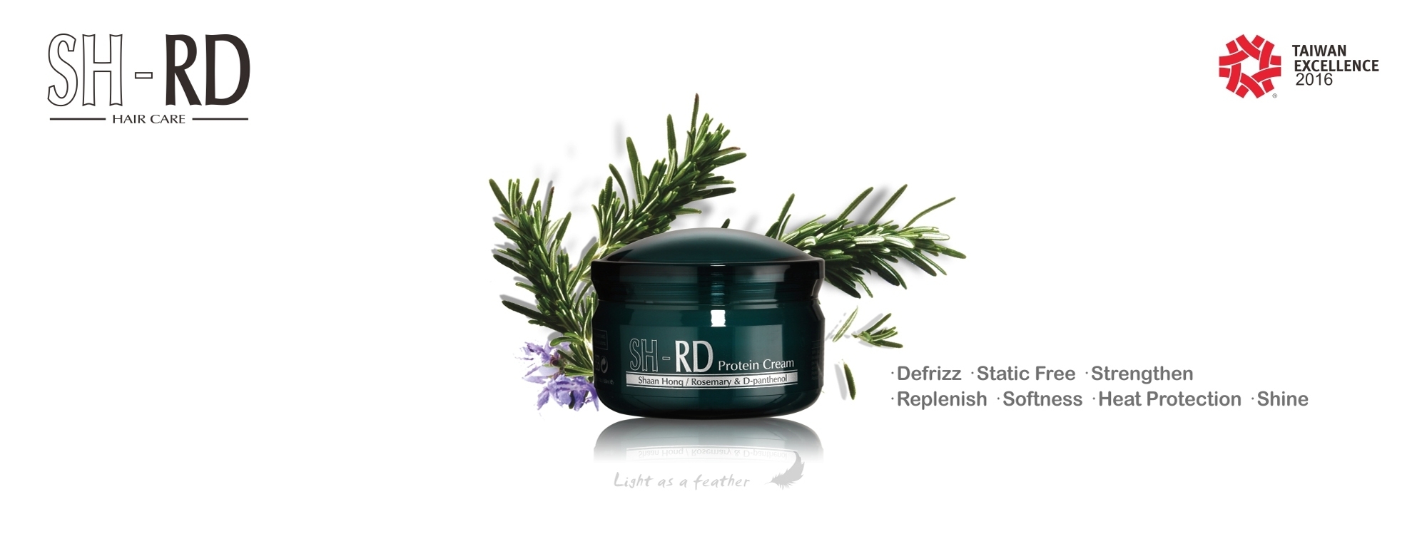 一罐绿色瓶身的护发霜后面有迷迭香植物