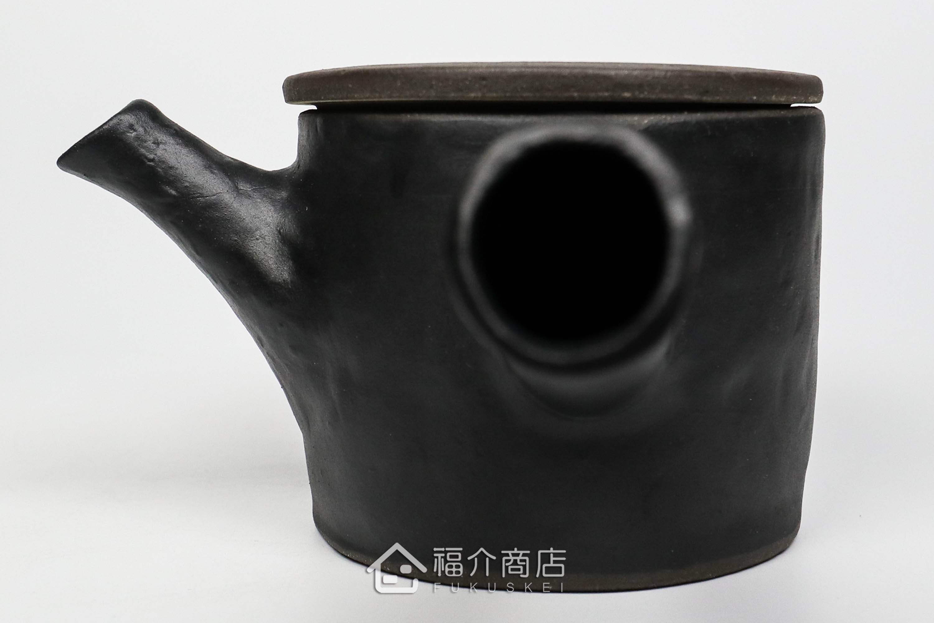 泡茶用的黑色陶茶壺