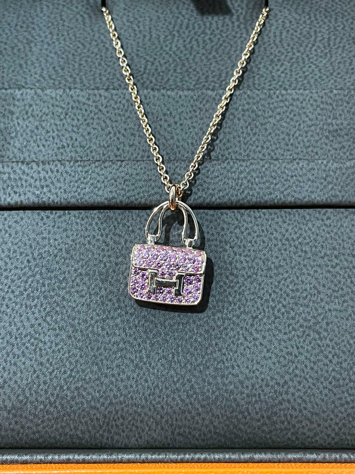 Pendant in rose gold and pink sapphire gemstones with Kelly snap closure
