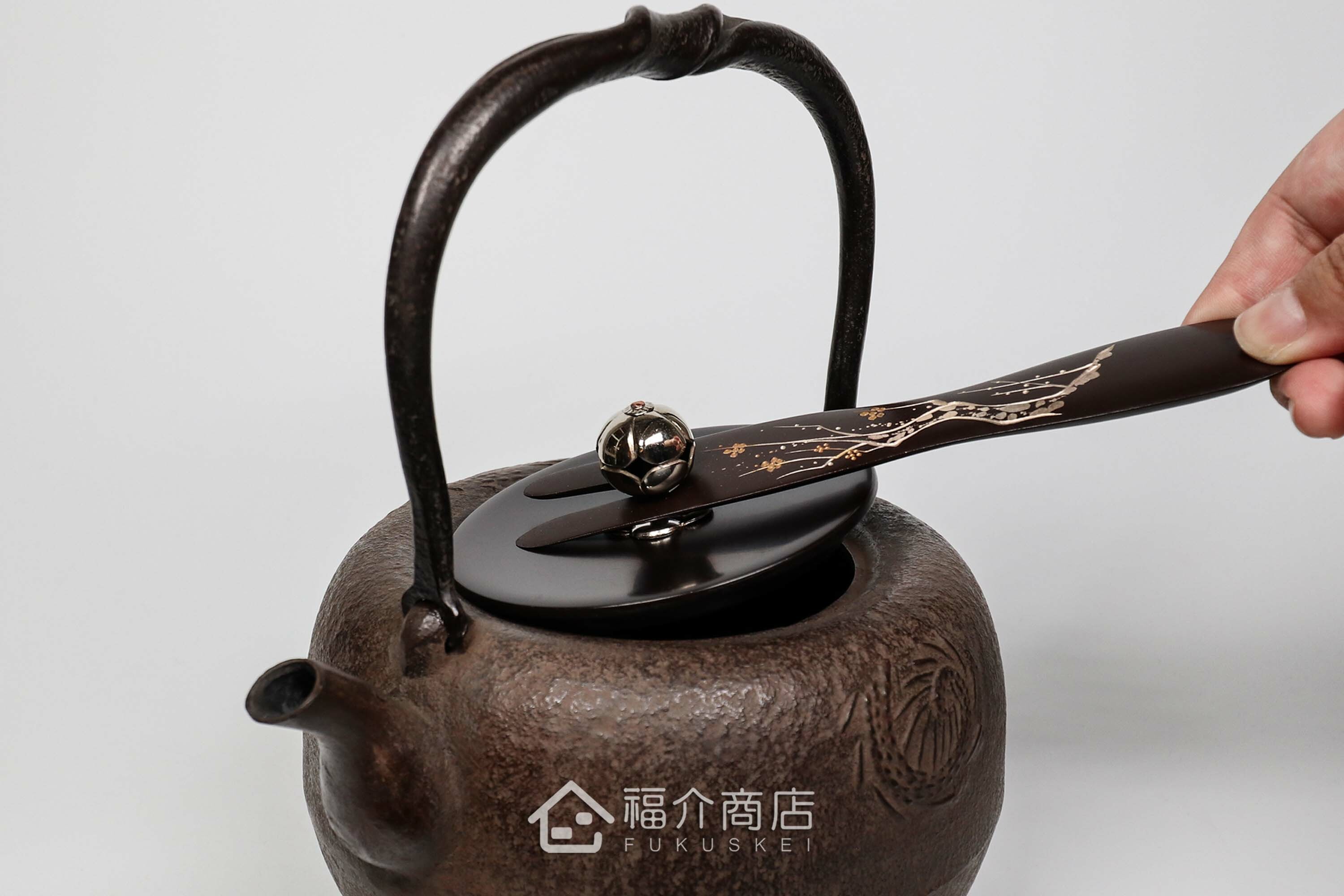 拿起壺蓋用的蓋取