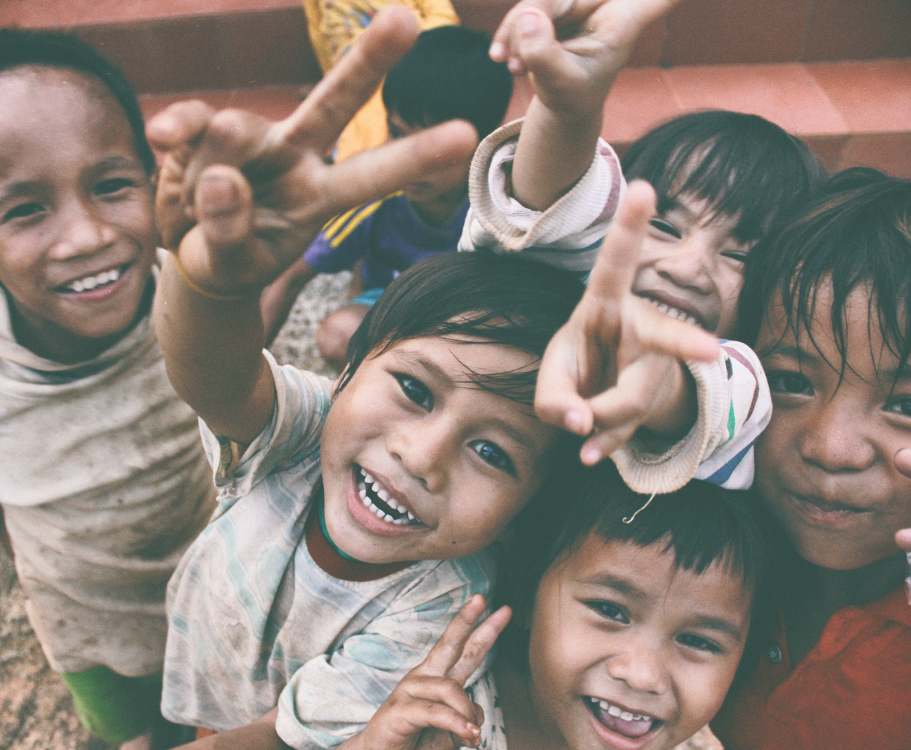 <img src="Children-gathering-and-laughing-together.jpeg" alt="Children-gathering-and-laughing-together">