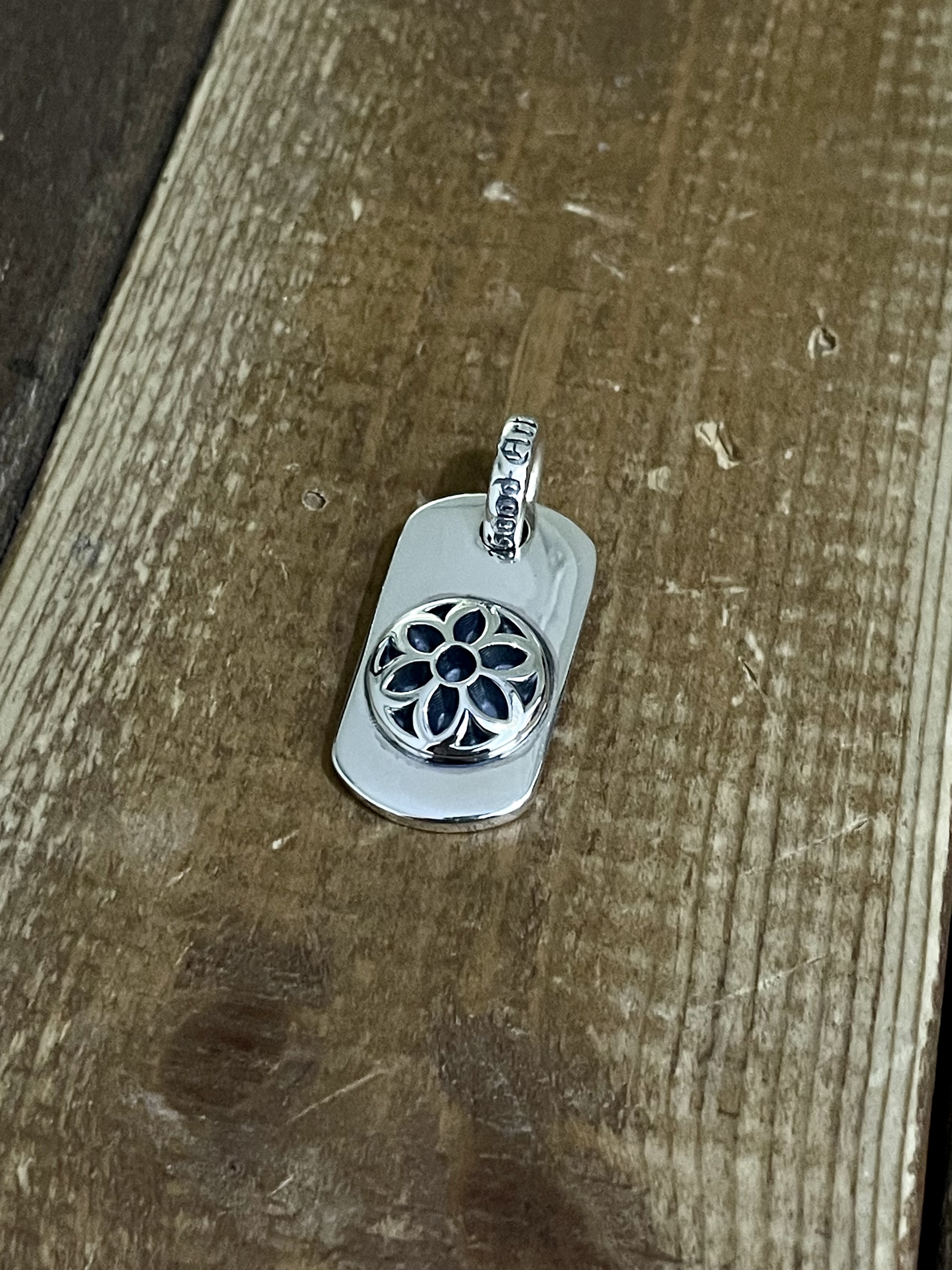Raised rosette Dog Tag