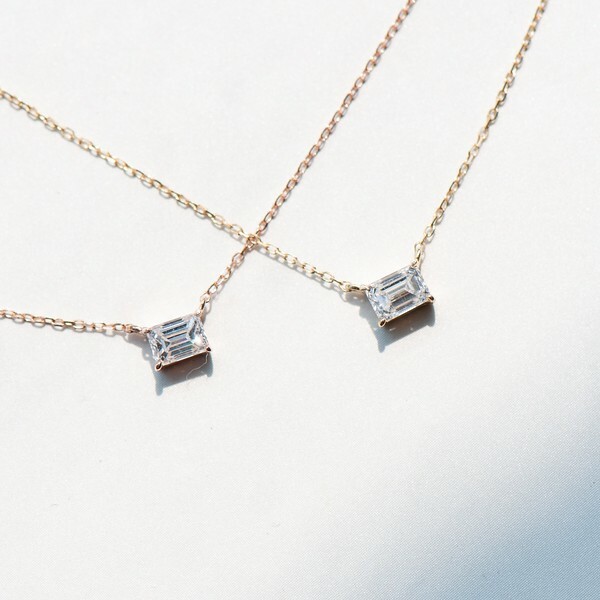 18K Emerald cut diamond necklace