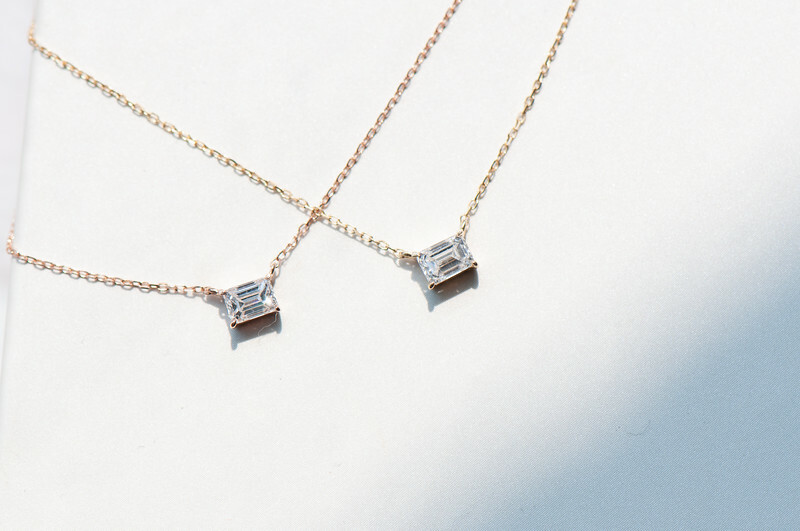 18K Emerald cut diamond necklace