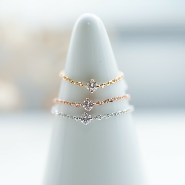 18K 0.05ct diamond chain ring