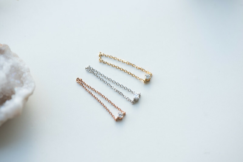 18K 0.05ct diamond chain ring