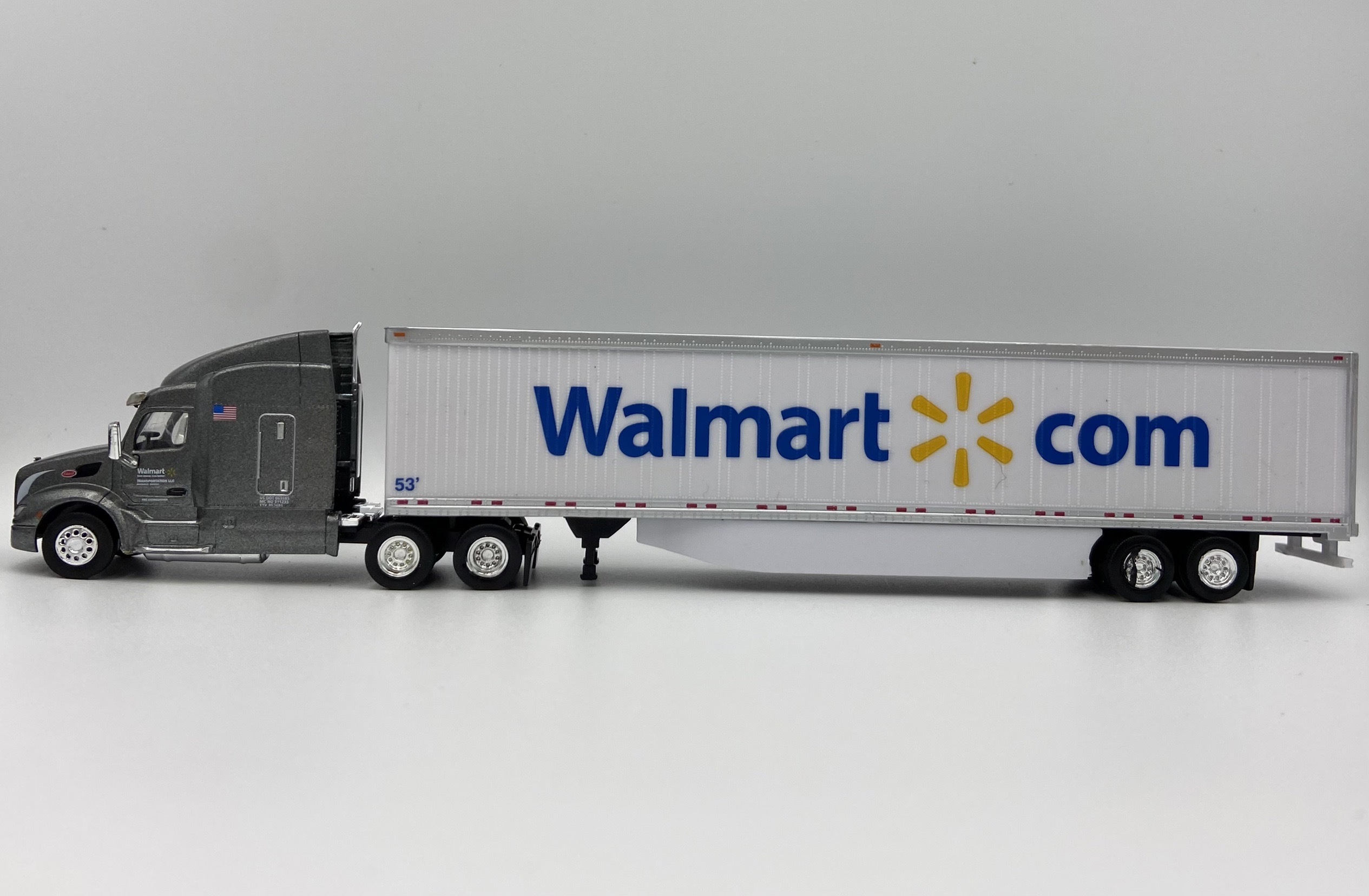 TrucksnStuff 46114 HO Scale Peterbilt 579 Sleeper Cab Tractor with 53' Dry Van Trailer - Assembled -- Walmart (Fuel Saver Special Edition; gray, white, blue, yellow; Spark Logo)