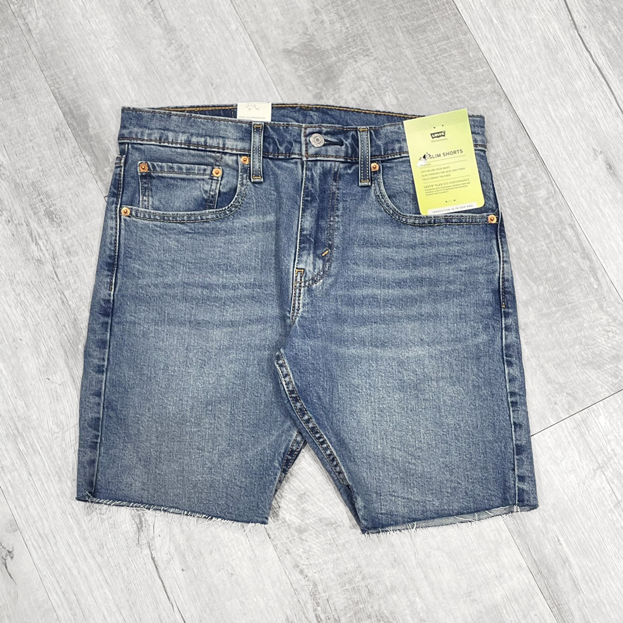 LEVI'S 412-0016貓鬚 膝上 修身窄管 牛仔短褲「刷色藍」【LVS4120016】