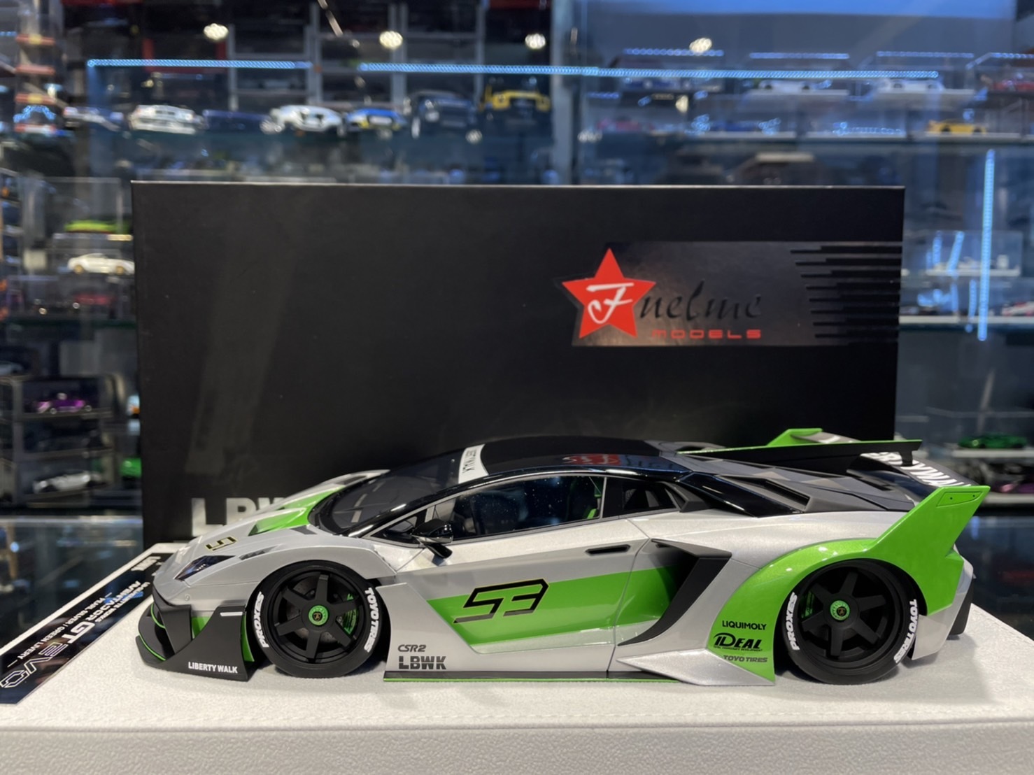 FuelMe FM18005LM-02 LBWK 700 GT EVO Silver/Green 1/18