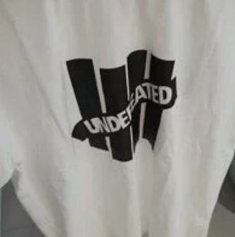 [S] UNDEFEATED LOGO SLANTED SHORT SLEEVE T-SHIRT,WHITE/BLACK, UDFATS004WH (SMW22)