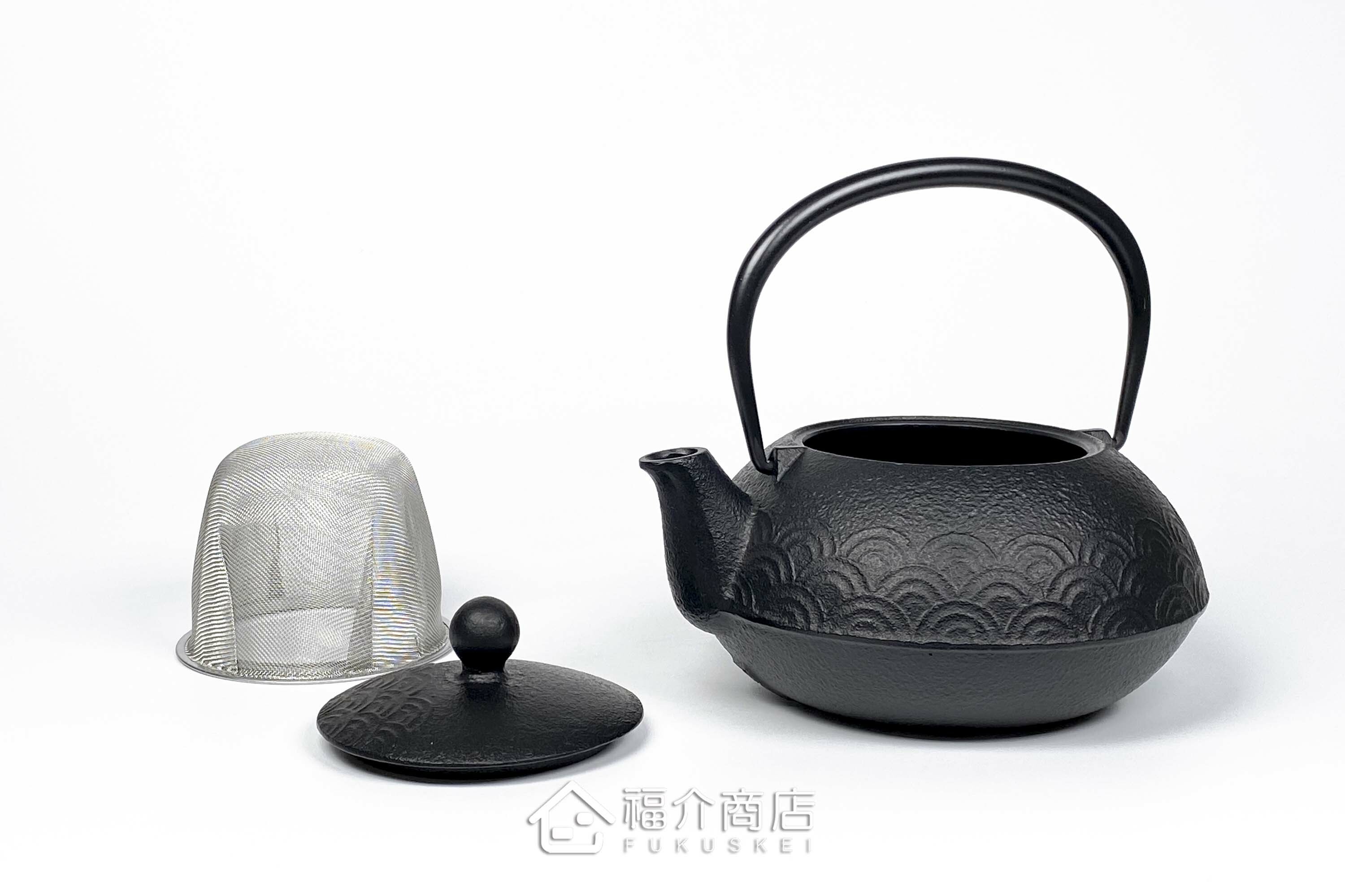 泡茶用的鐵壺與壺墊