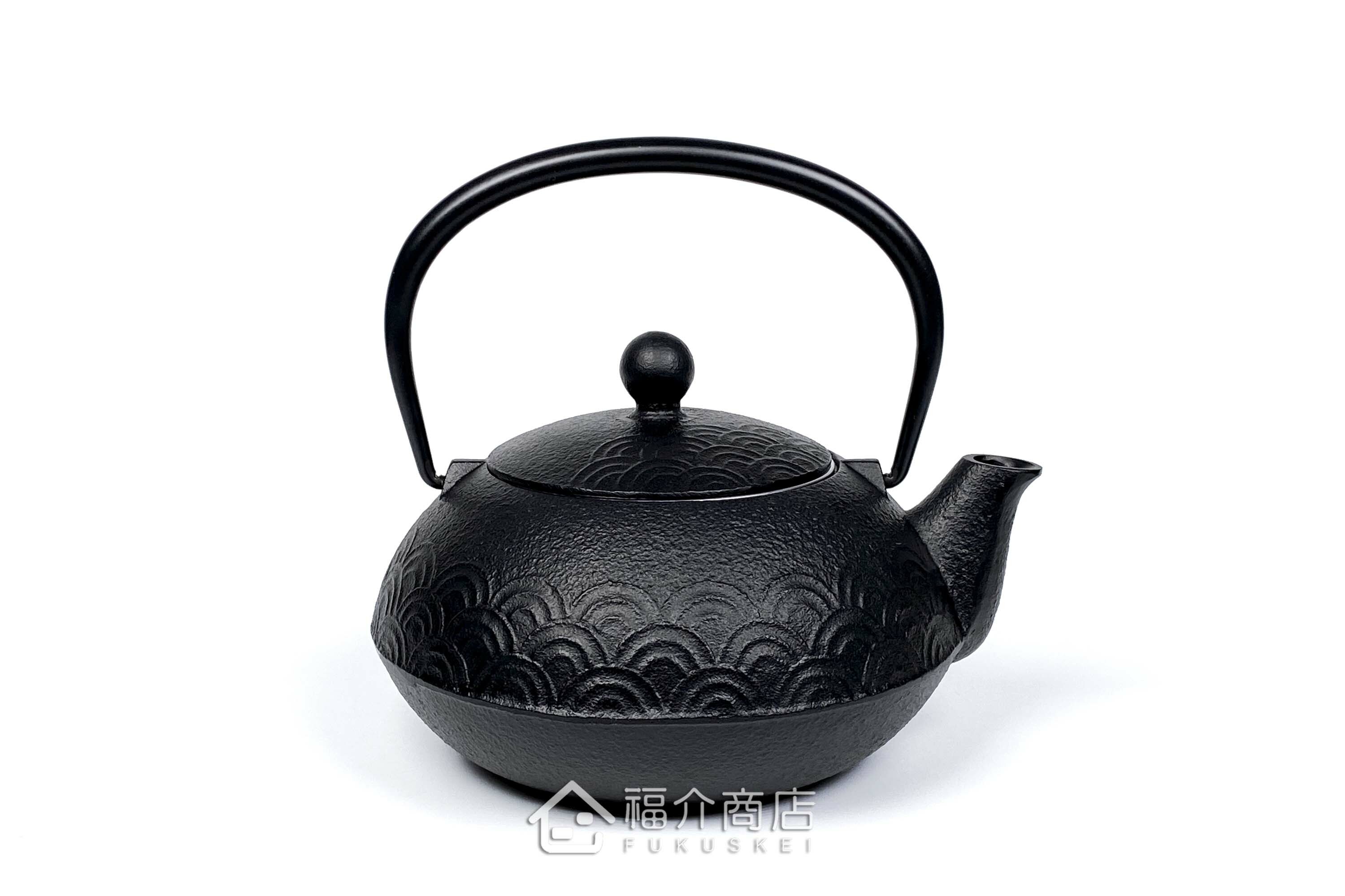 泡茶用的鐵壺與壺墊