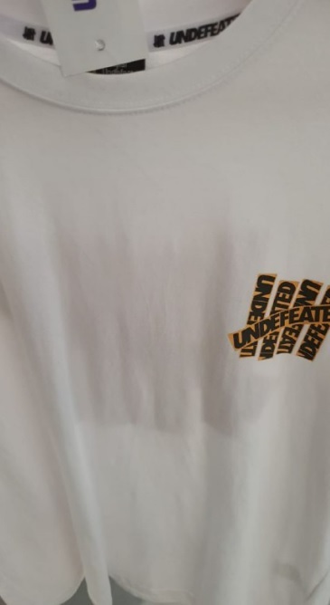 [S] UNDEFEATED TAPE LOGO OVERSIZED SHORT SLEEVE T-SHIRT,WHITE, UN21SS-TS100WH (SMW36)