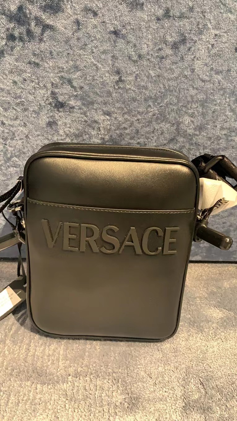 VERSACE LEATHER MESSENGER SLING BAG WITH WORDS LOGO