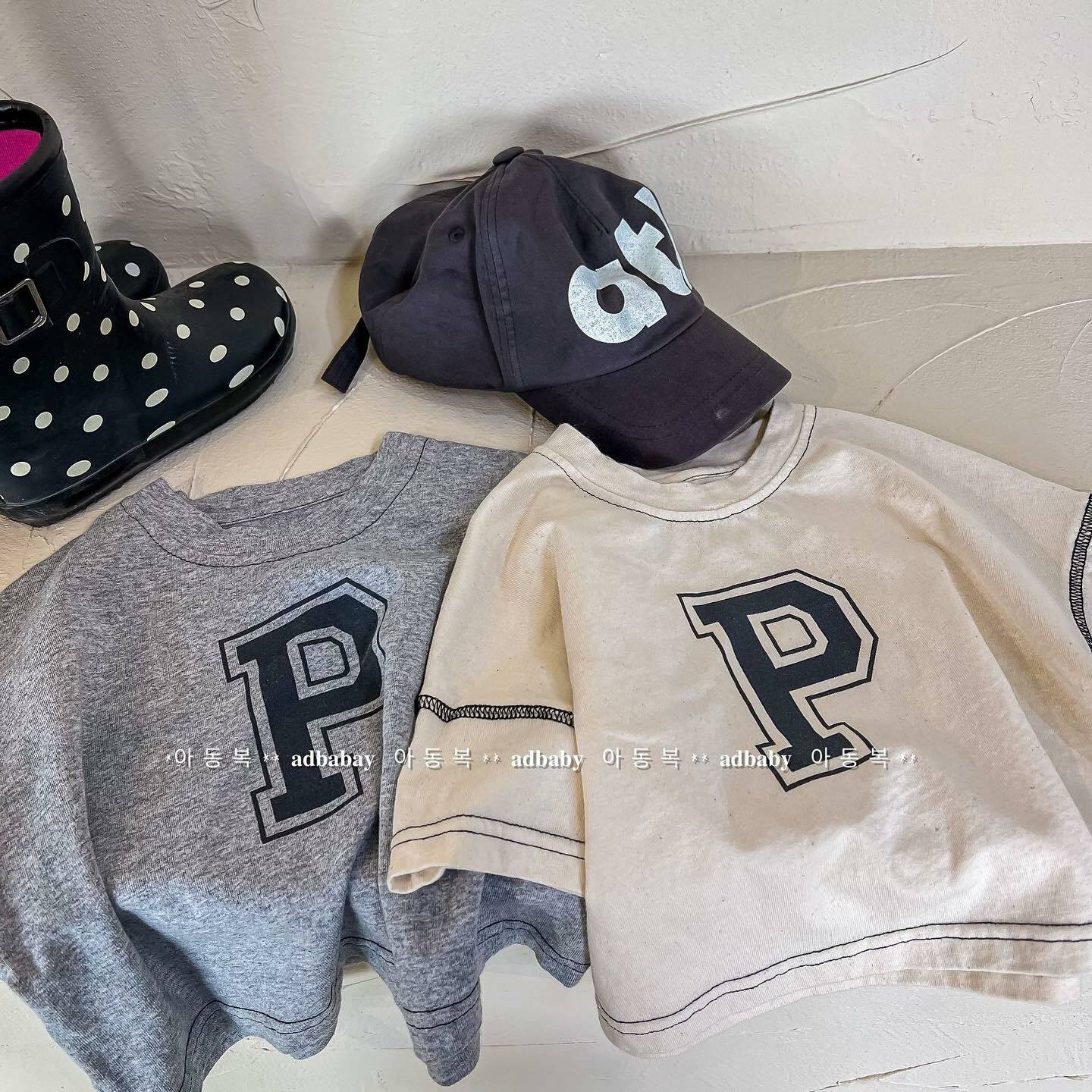 不分男女寶蝙蝠袖字母P上衣