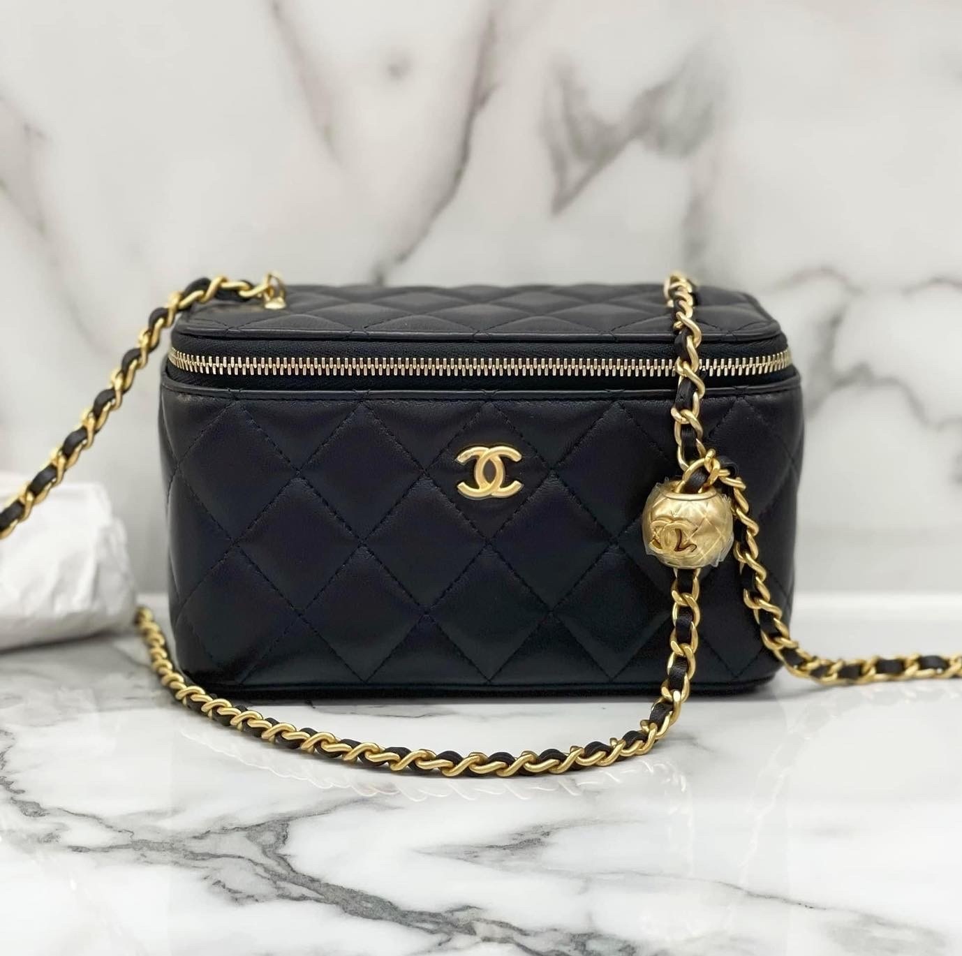 Chanel vanity case gold ball