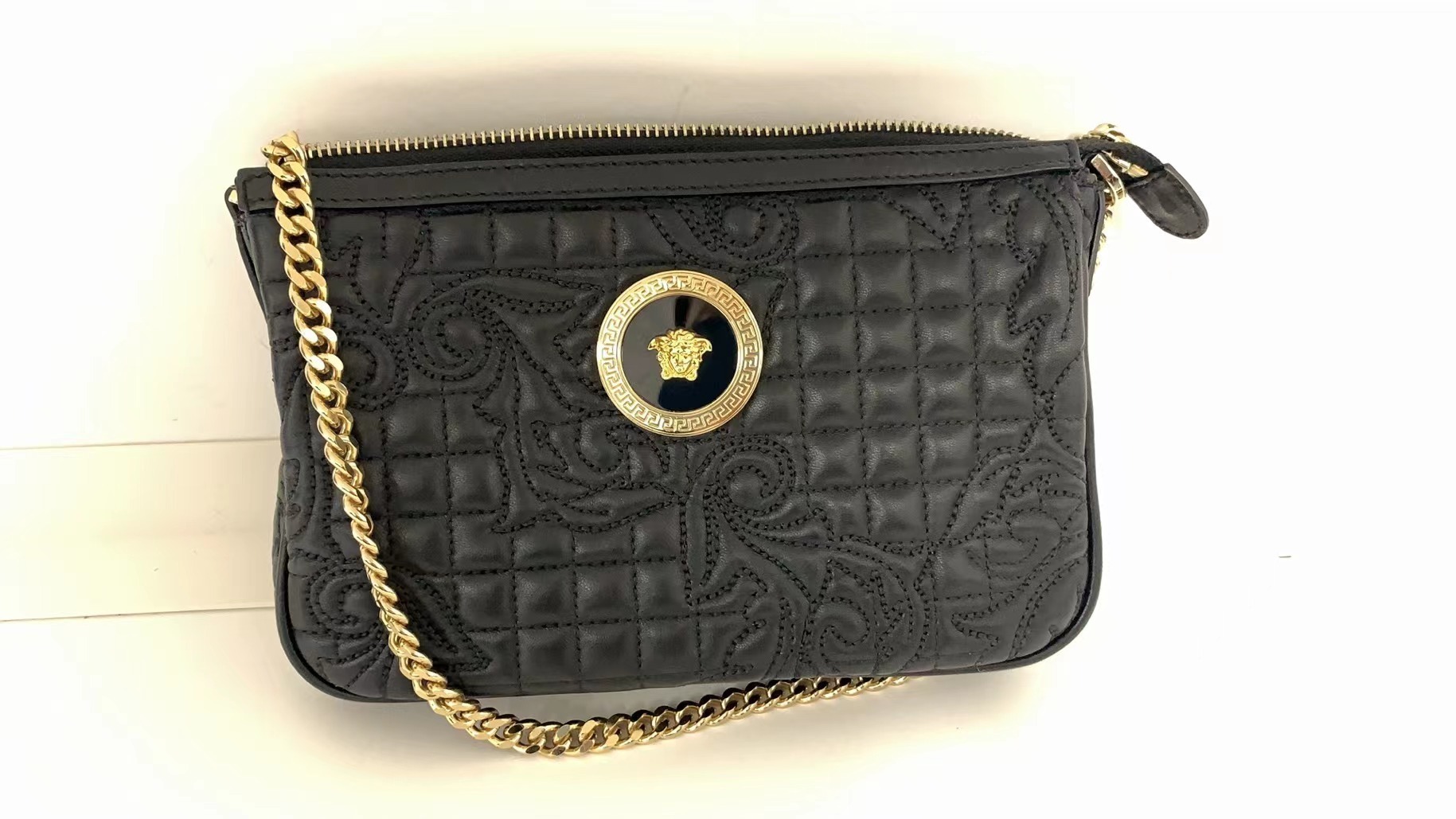 VERSACE SLING BAG WITH CHAIN AND MEDUSA HEAD LOGO