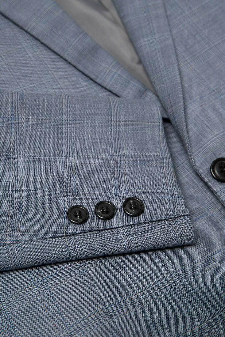 淺藍色西裝外套-排扣設計