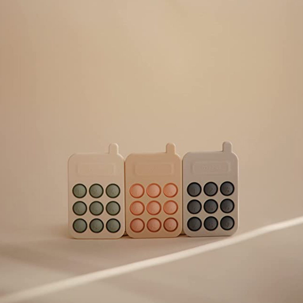 美國Mushie 手機按壓玩具-劍橋藍/腮紅/海洋藍 3色可選