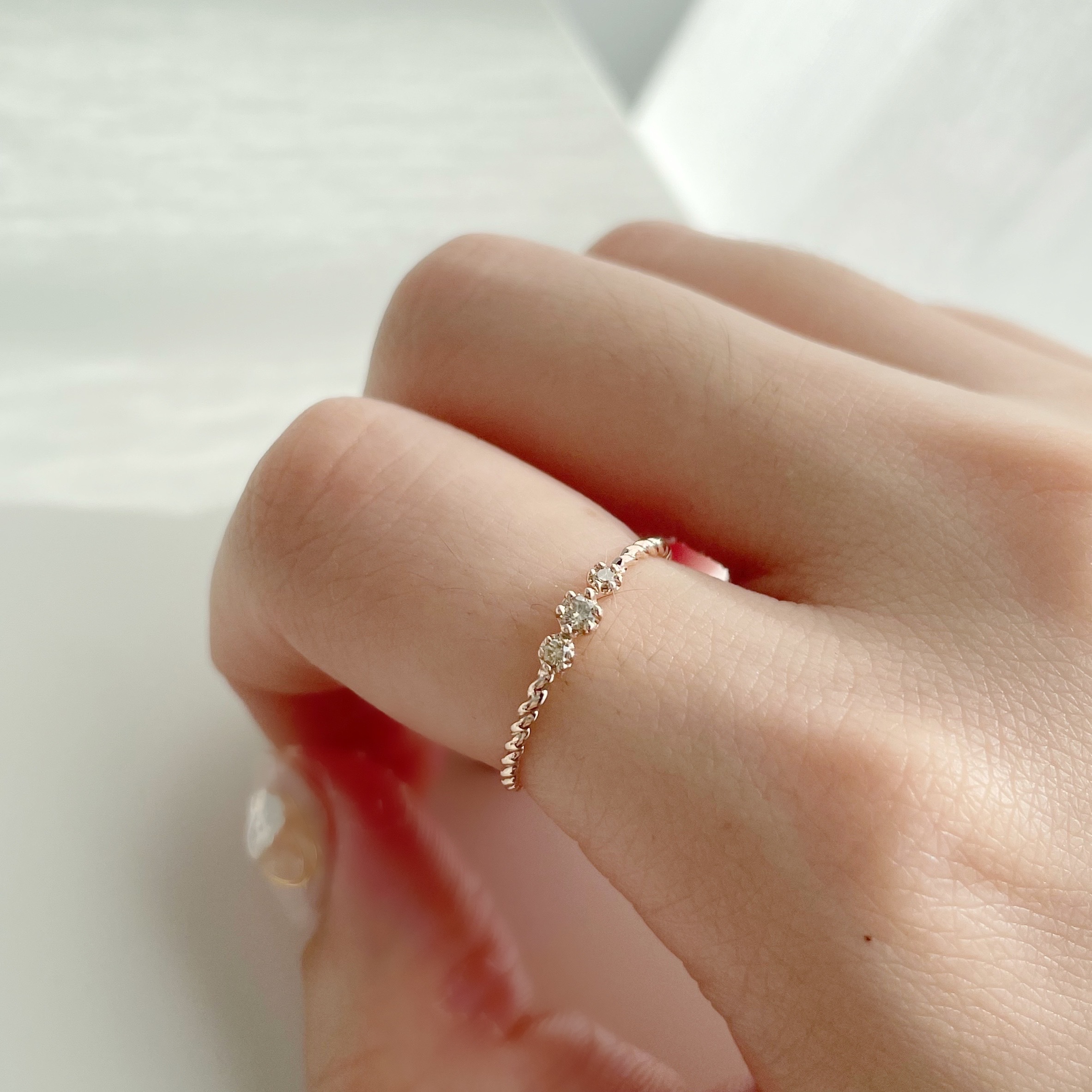 14k三顆小花亮棕鑽麻花戒指