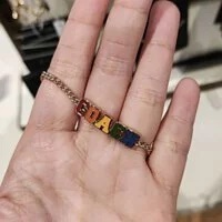 [S] COACH CD806 OUTLET LOGO VARSITY CHAIN BRACELET, GOLD/MULTI, 889295487143 (SCO86)