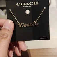 [S] COACH CD792 OUTLET LOGO SCRIPT NECKLACE, GOLD, 889295487082 (SCO87)