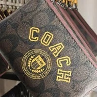 [S] COACH CB855 CORNER ZIP VARSITY WRISTLET SIG LEATHER,BROWN/BUTTERCUP, 195031680472 (SCO98)