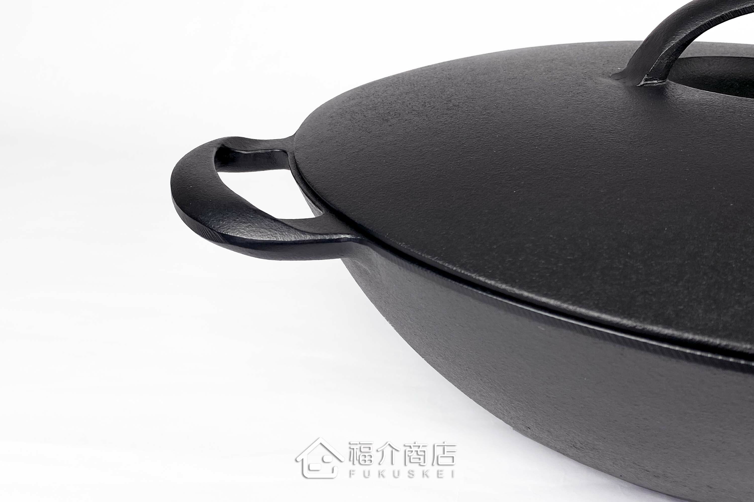 黑色鑄鐵製的中華炒鍋