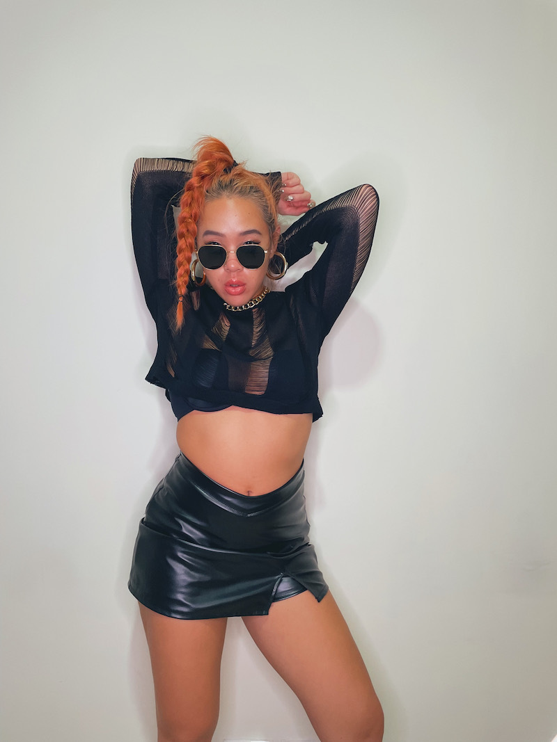 辣黑Ｖ字低腰皮裙