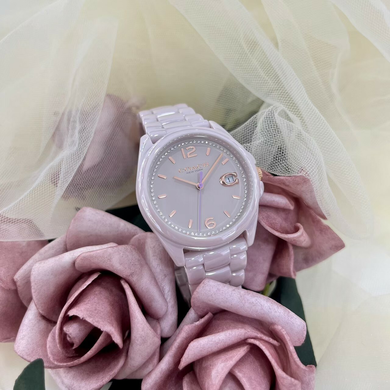 【Coach】經典Logo粉陶瓷日曆女錶 CO14503926 36mm  現代鐘錶