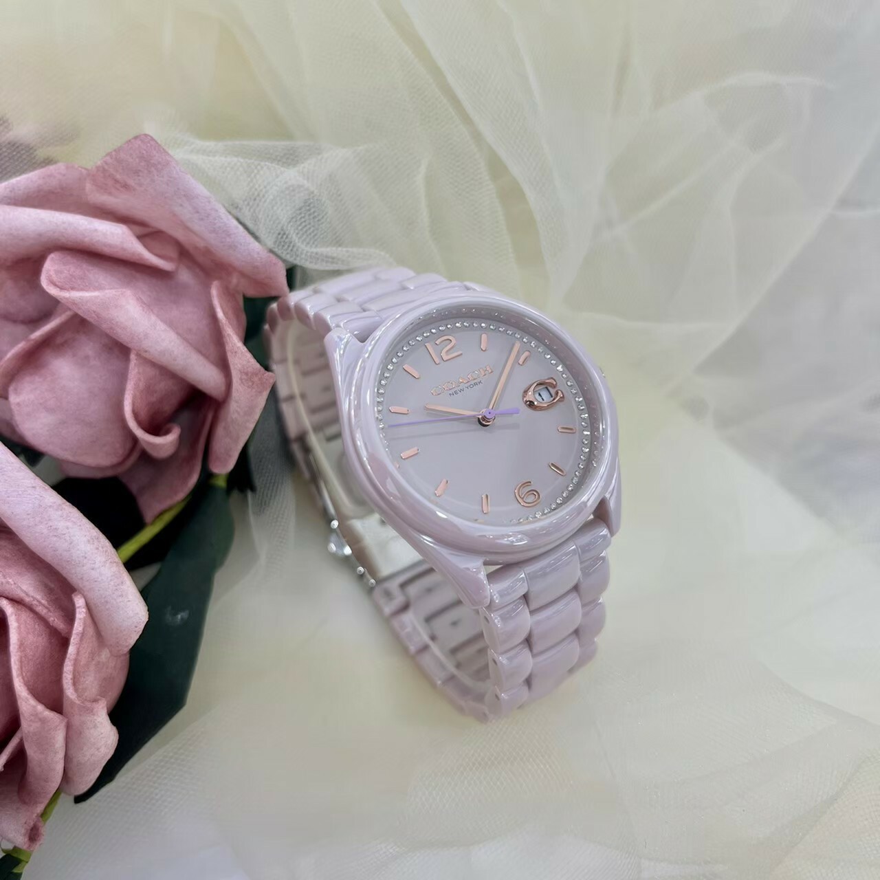 【Coach】經典Logo粉陶瓷日曆女錶 CO14503926 36mm  現代鐘錶