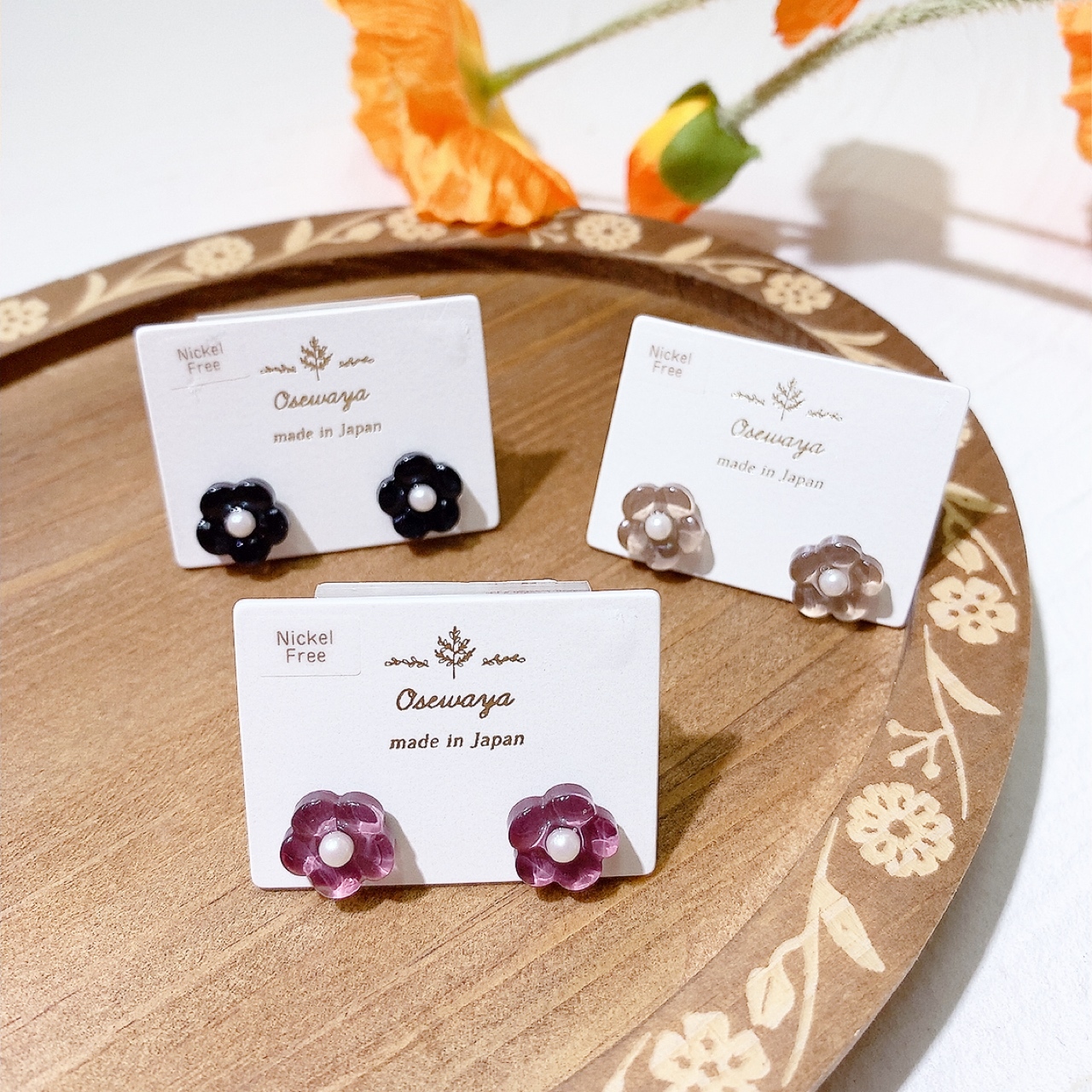 [日本制] 細粒珍珠花形耳環