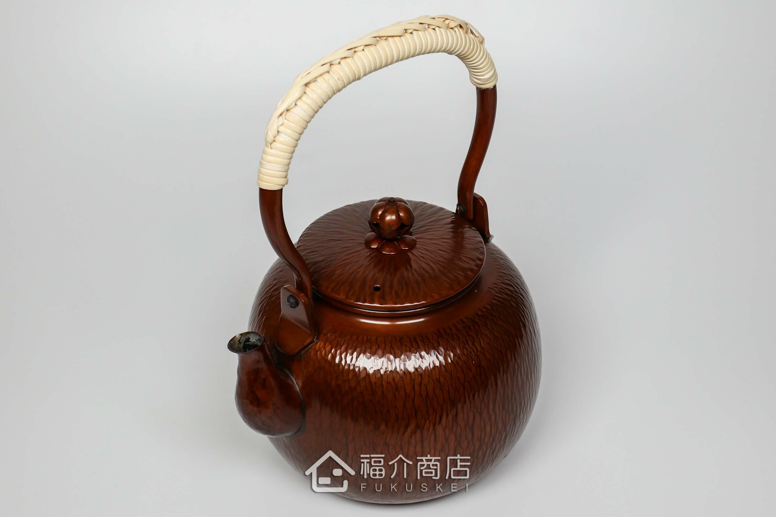 煮水泡茶用的咖啡色銅壺
