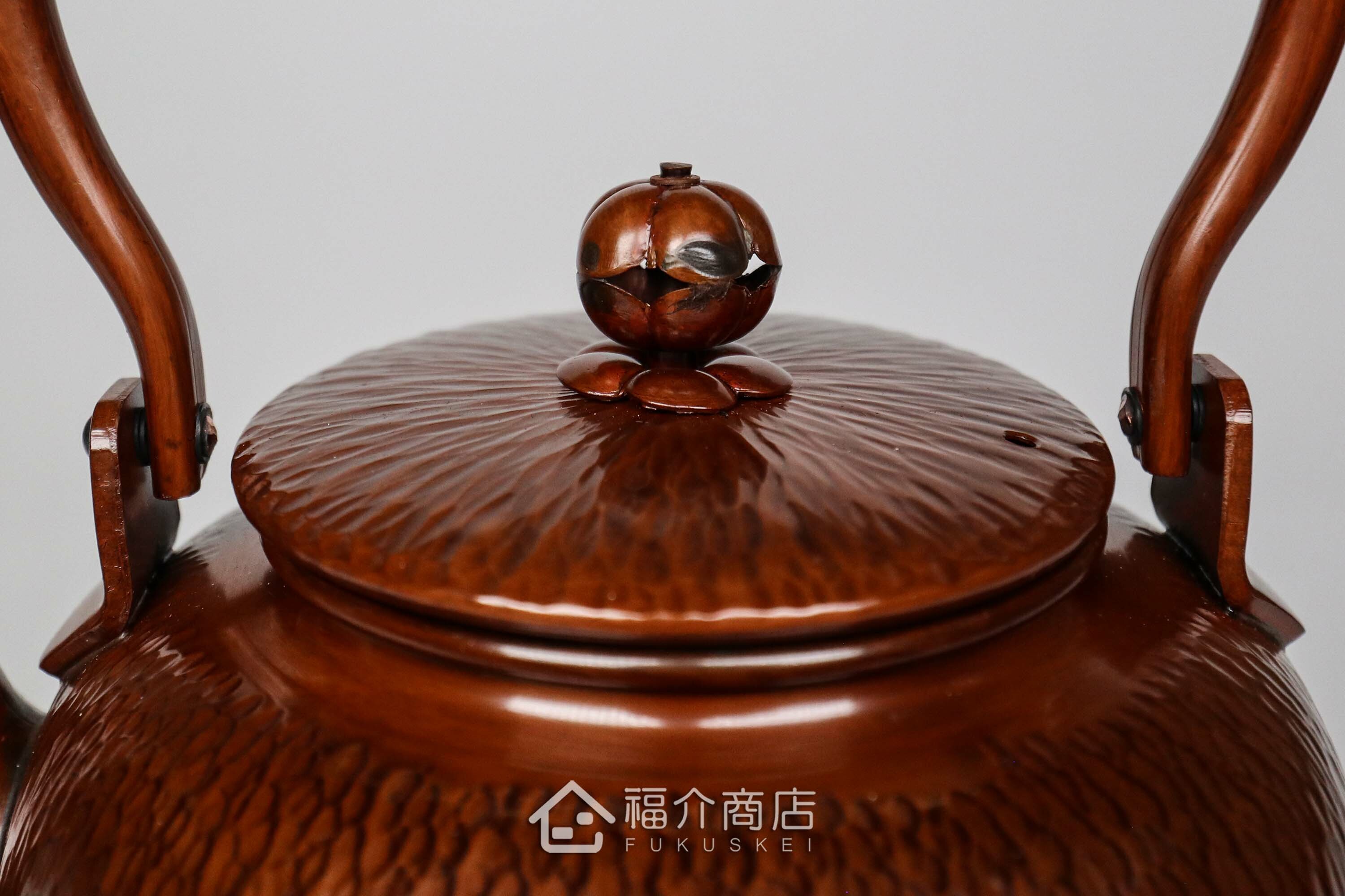 煮水泡茶用的咖啡色銅壺