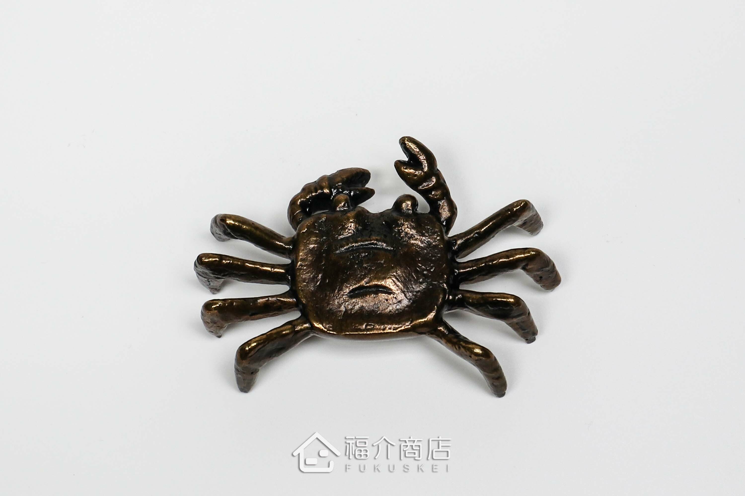 銅製螃蟹造型的茶壺蓋放置工具