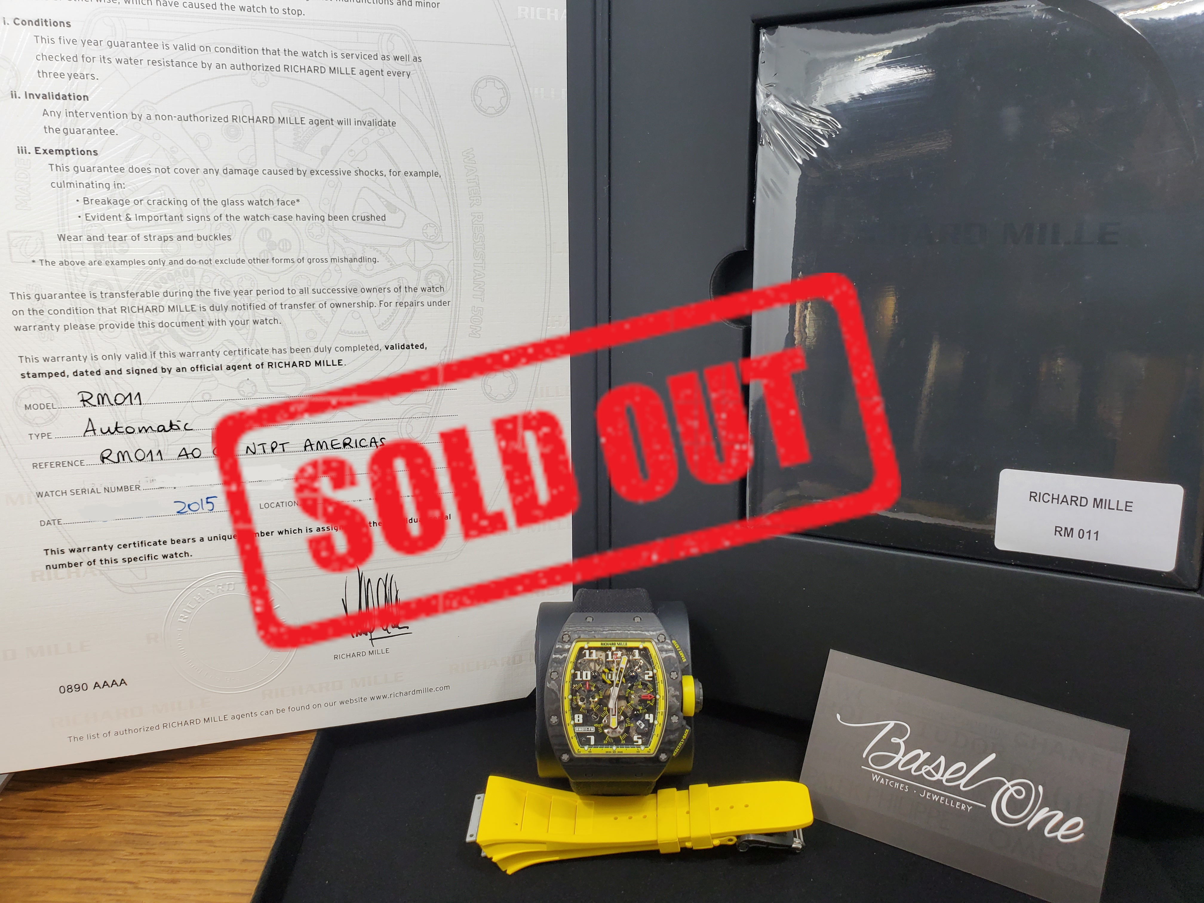PRE-OWNED RICHARD MILLE RM011 NTPT CARBON AMERICAS "YELLOW STORM" LIMITED EDITION OF 50PCS 40 MM