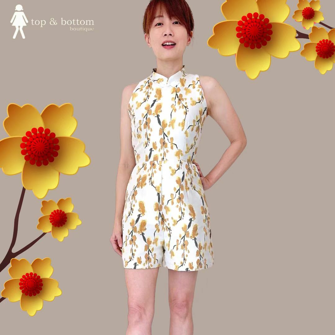 CUT IN FLORAL SHORT JUMPSUIT