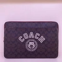 [S] COACH CB857 LAPTOP SLEEVEIN SIGNATURE CANVAS WITH COACH VARSITY,IM/BROWN/CHALK MULTI, 195031678332 (SCO161)