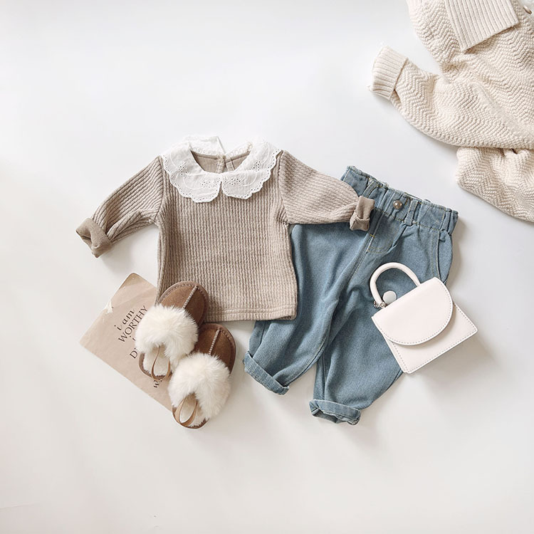 布蕾絲坑條上衣