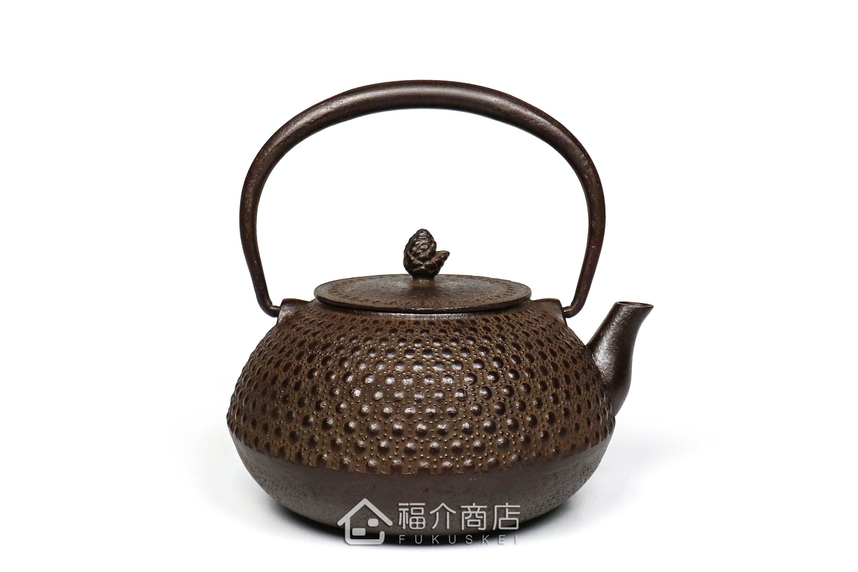 佐藤勝久所製作的日本鐵壺,壺身設計龜甲霰圖紋
