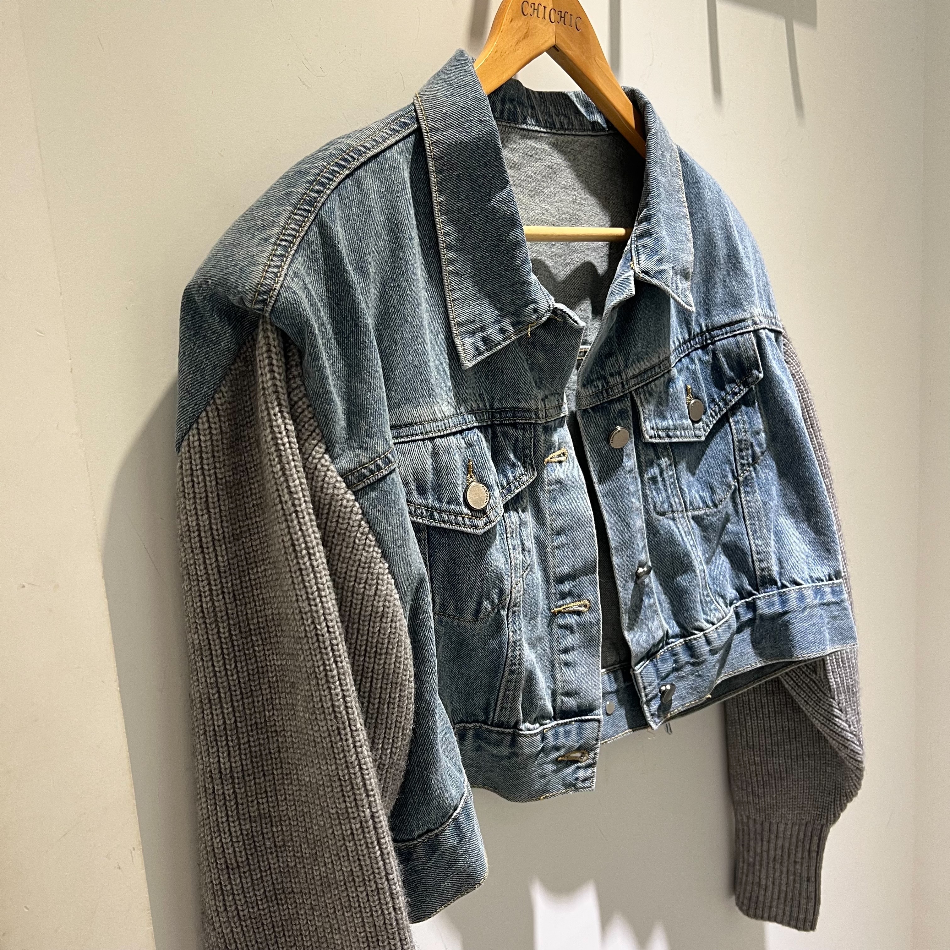 設計拼接袖小墊肩短版牛仔夾克