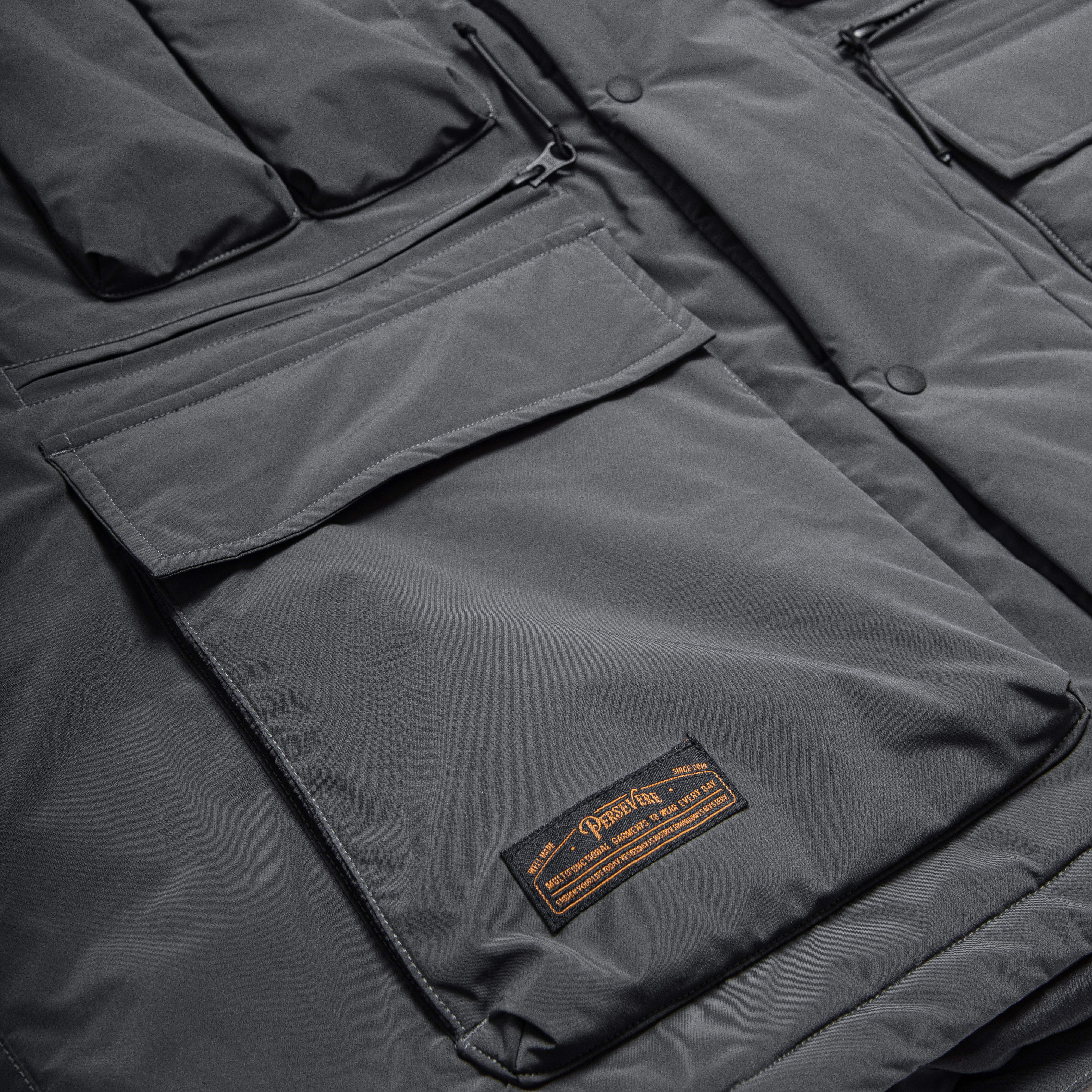 PERSEVERE MULTI-POCKET PADDED JACKET - SMOKE GREY
